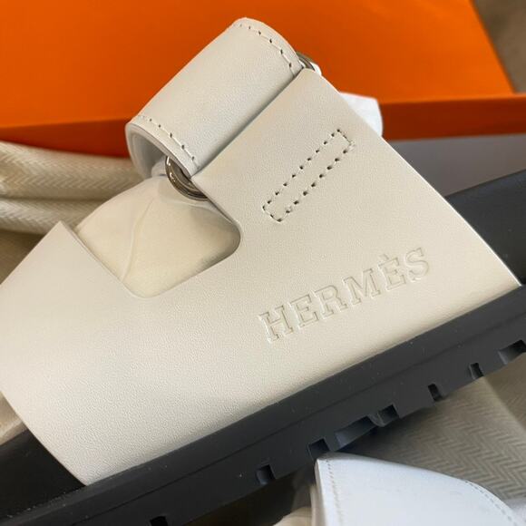 Chypre leather flip flops Hermès White size 40 EU in Leather  NEW Hermes Chypre White Black Leather Slide Sandal EU 40 Womens
